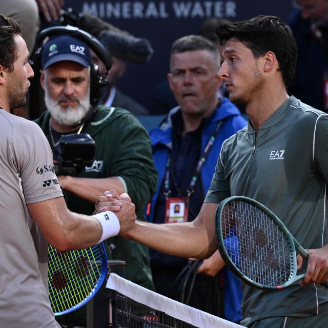 Luciano Darderi čestita Casperu Ruudu