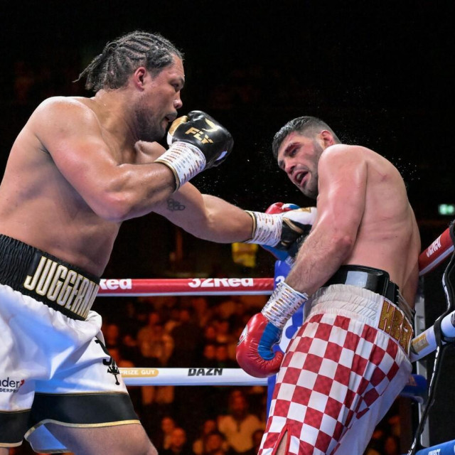5th April 2025; Co Op Live Arena, Manchester, England; Heavy Impact Heavyweight Boxing, Joe Joyce versus Filip Hrgovic; Joe Joyce pressures Filip Hrgovic into the corner,Image: 984347011, License: Rights-managed, Restrictions:, Model Release: no, Credit line: Lee Durkin/Actionplus/Profimedia