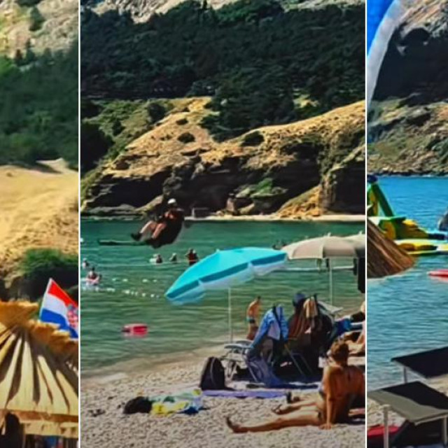 Paraglajder slijeće na plažu u Baškoj