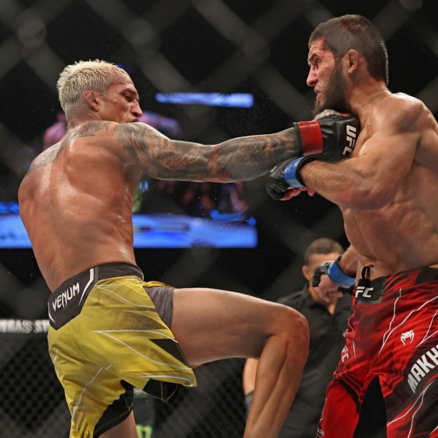Islam Makhachev (R) competes against Charles Oliveira in the lightweight championship at the Ultimate Fighting Championship (UFC) event at the Etihad Arena in Abu Dhabi on October 22, 2022.,Image: 732551186, License: Rights-managed, Restrictions:, Model Release: no, Credit line: Giuseppe CACACE/AFP/Profimedia