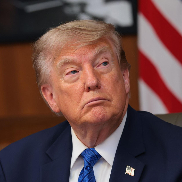 CAMP DAVID, MARYLAND - JULY 31: U.S. President Donald Trump listens to questions from reporters during a Cabinet meeting at Camp David, the presidential retreat, on July 31, 2026 in Camp David, Maryland. Trump convened members of his Cabinet at the presidential retreat as the war with Iran continues. Anna Moneymaker/Getty Images/AFP (Photo by Anna Moneymaker/GETTY IMAGES NORTH AMERICA/Getty Images via AFP)