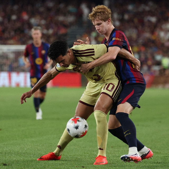 Monsef Bakrar (AL Ahly) i Jordi Pesquer (Barcelona)