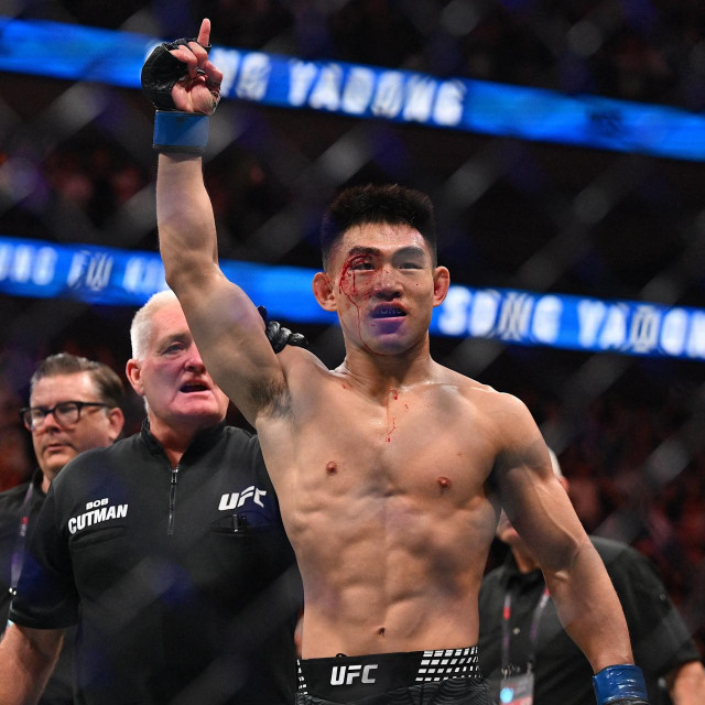 China‘s Song Yadong celebrates after winning against Russia‘s Umar Nurmagomedov in their men‘s bantamweight fight during the UFC Fight Night at Oriental Sports Center in Shanghai on August 29, 2026.,Image: 1129095690, License: Rights-managed, Restrictions:, Model Release: no, Credit line: Jade Gao/AFP/Profimedia