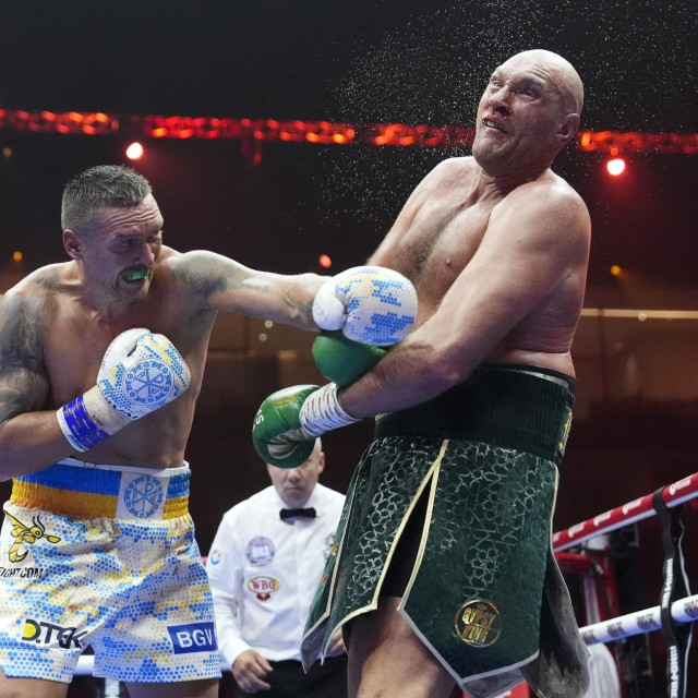 Oleksandr Usik (lijevo) vs. Tyson Fury (desno)