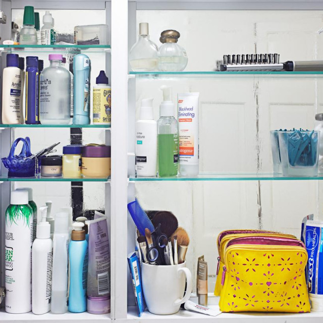 Medicine cabinet fill hair products, cosmetics, toiletries, etc.
